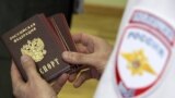 ROSTOV REGION, RUSSIA - JUNE 14, 2019: Russian passports for residents of the Lugansk People's Republic (LPR) at a passport distribution center in Novoshakhtinsk. Alexander Reka/TASS